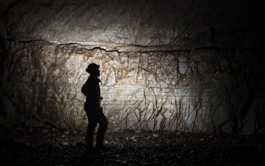 A potholer explores Gaping Gill, the largest cavern in Britain, situated in Yorkshire Dales National Park, ahead of its opening the public next weekend