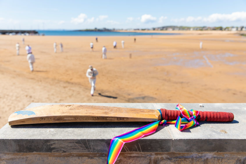 Cricket players from the Ship Inn and Borderers teams hold the first match of the season at the beach on May 12, 2019 in Elie, Scotland. The Ship Inn pub is the only cricket team in the United Kingdom to play their matches on a beach. Over the course of a season they hold regular fixtures against Scottish clubs as well as touring teams from across the world.