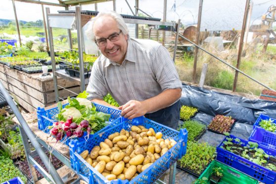 John Hepburn-Wright with some of his produce.