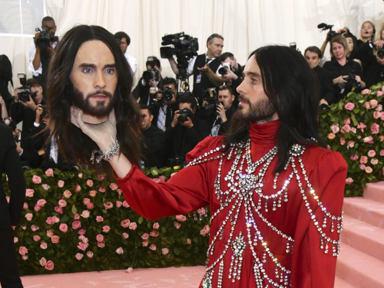 Jared Leto, holding a model of his own head, attends The Metropolitan Museum of Art's Costume Institute benefit gala celebrating the opening of the "Camp: Notes on Fashion" exhibition on Monday, May 6, 2019, in New York.