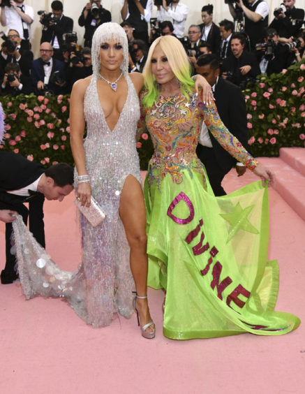 Jennifer Lopez, left, and designer Donatella Versace attend The Metropolitan Museum of Art's Costume Institute benefit gala celebrating the opening of the "Camp: Notes on Fashion" exhibition on Monday, May 6, 2019, in New York.