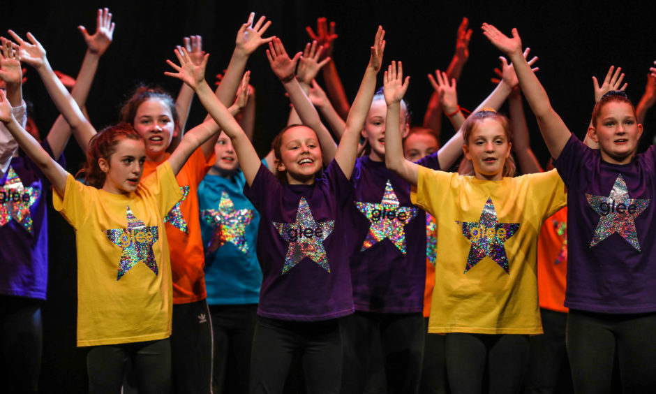 Pupils from Oakbank Primary School perform.