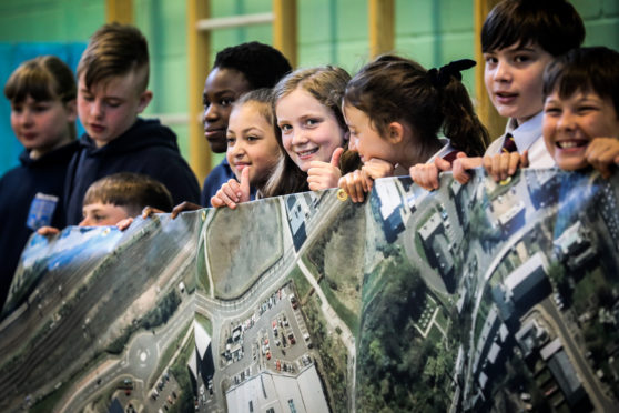 Pupils from the schools look at the map of Perth Road.