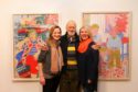 Norman Gilbert with Tatha Gallery owners Helen Glassford and Lindsay Bennett in 2018.