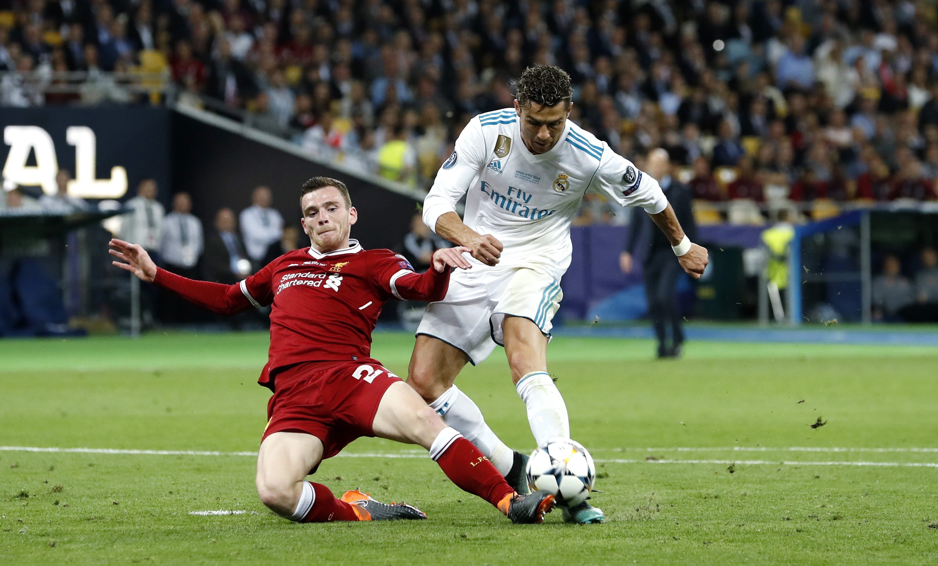 Andy Robertson make a last-ditch challenge on Ronaldo in last year's Champions League final.