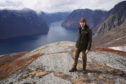 Professor Brian Cox on location at Stegastein, overlooking Aurlandsfjorden in Norway.