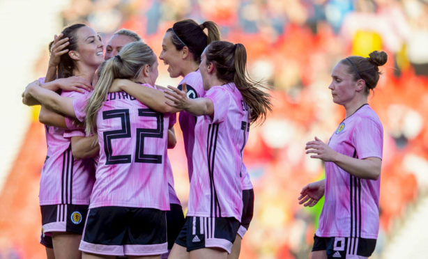 The Scots celebrate Caroline Weir's goal.