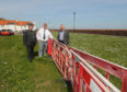 From left, councillors David Graham, Colin Davidson and Ken Caldwell at the barriers in West Wemyss