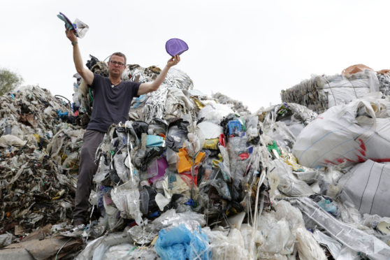 Hugh finds British plastics at a site in Malaysia. Picture: BBC.