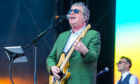 Squeeze performing during BBC's Biggest Weekend at Scone Palace in 2018.