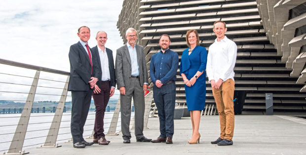 Caption information: L-R Andrew Walker, corporate finance partner and Dundee project leader; Ryan Milne, business advisory manager; Sir Pete Downes, senior consultant; Ryan Diplexcito, business advisory partner; Jenn Stewart, restructuring director; Andrew McMillan, innovation taxes senior manager.   Pic Alan Richardson Pix-AR.co.uk Free to Use Johnston Carmichael, Dundee