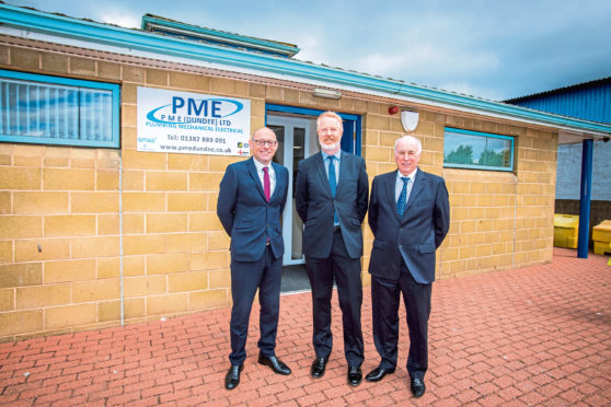 PME directors from left, Martin Hay, Grant McConnachie and Dave Page outside their new premises. Picture: Steve MacDougall.