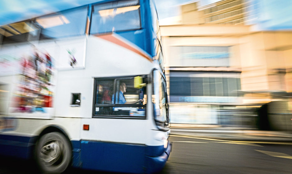 Stagecoach bus being driven through Dundee city centre