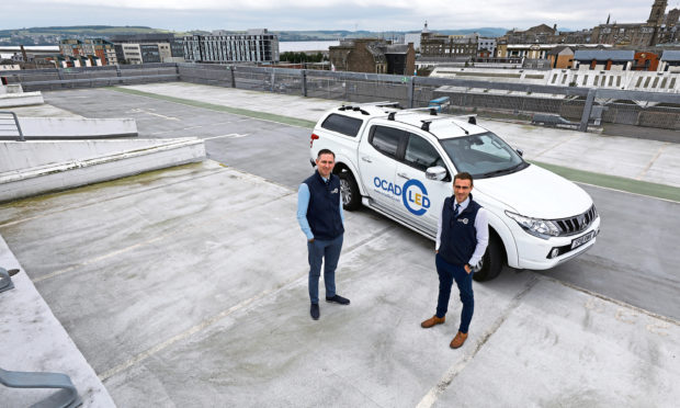 OCAD LED managing director Euan Donaldson and project manager Gary Mackie at Olympia car park in Dundee, where they have upgraded the lighting systems.