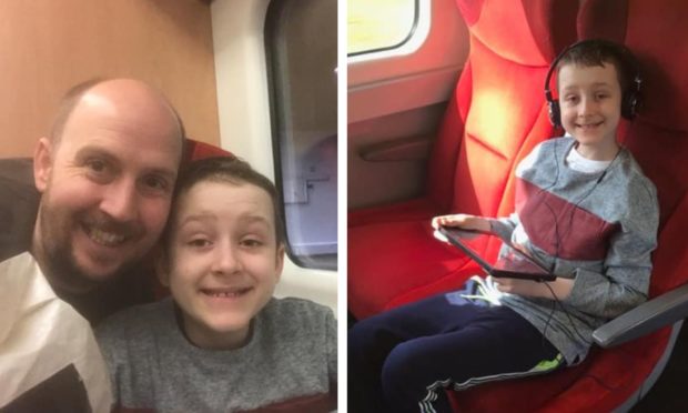 Aaron Murphy and his dad Dougie during their recent trip to Great Ormond Street Hospital in London (left).