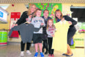 Grange kids Frankie Joss, 5, and Libby Robertson, 4, are with Carolyn Grant,, Rev Fiona Reynolds and Gill Crooks.