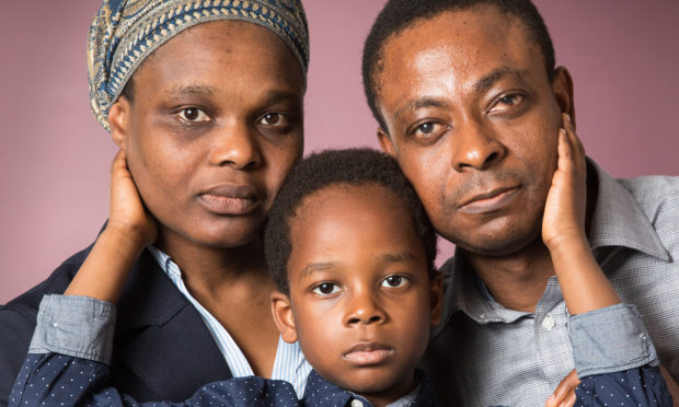 Bamidele Chika Agbakuribe with his wife and son Michael.