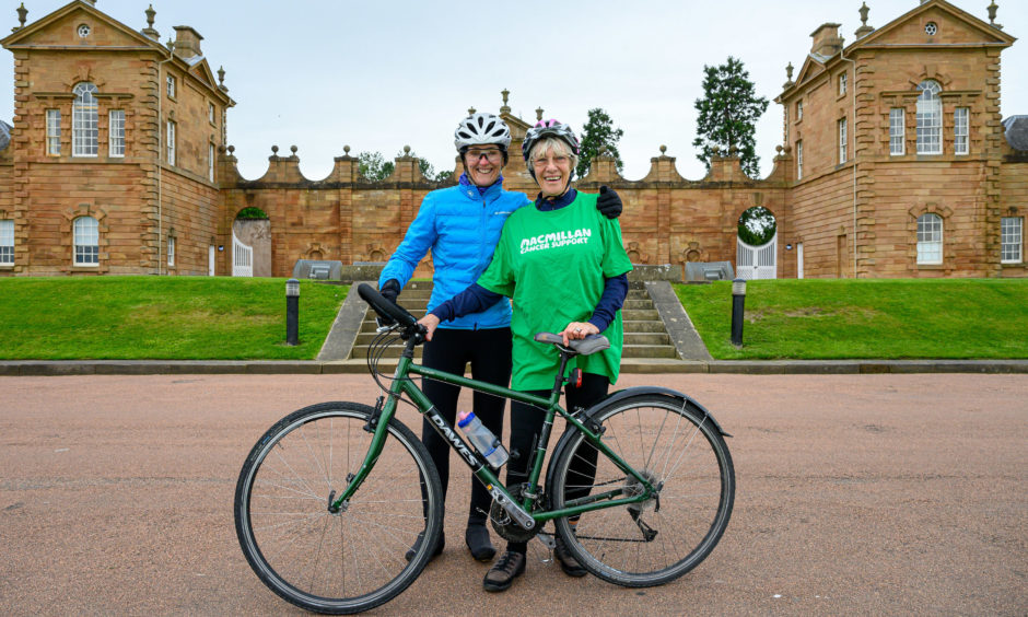 Charity cyclist Mavis Paterson, 81, with a supporter at Chatelherault Country Park, South Lanarkshire, who is cycling the length of Britain in memory of her three children has said she is "feeling really strong" as she enters the final days of her journey. Mavis Paterson, who lives near Stranraer in Dumfries and Galloway, set out on May 30 from Land's End and aims to reach John O'Groats on June 21.