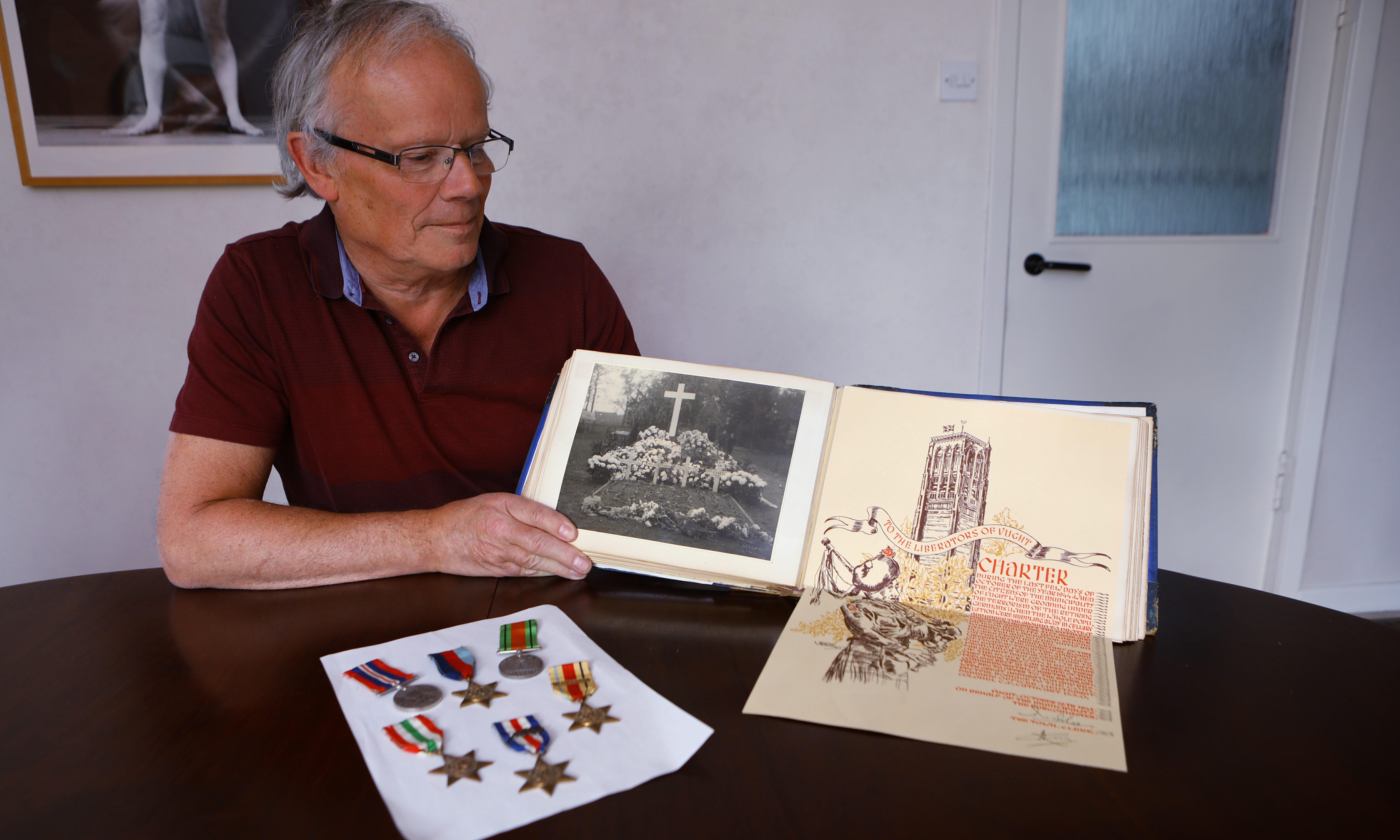 Roy Robertson at home in Newport with some of the memorabilia relating to his father.