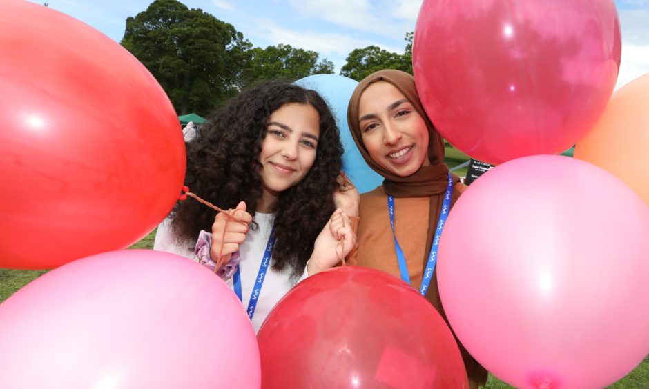Volunteers Hagar Manssour and Fatima Rehman.
