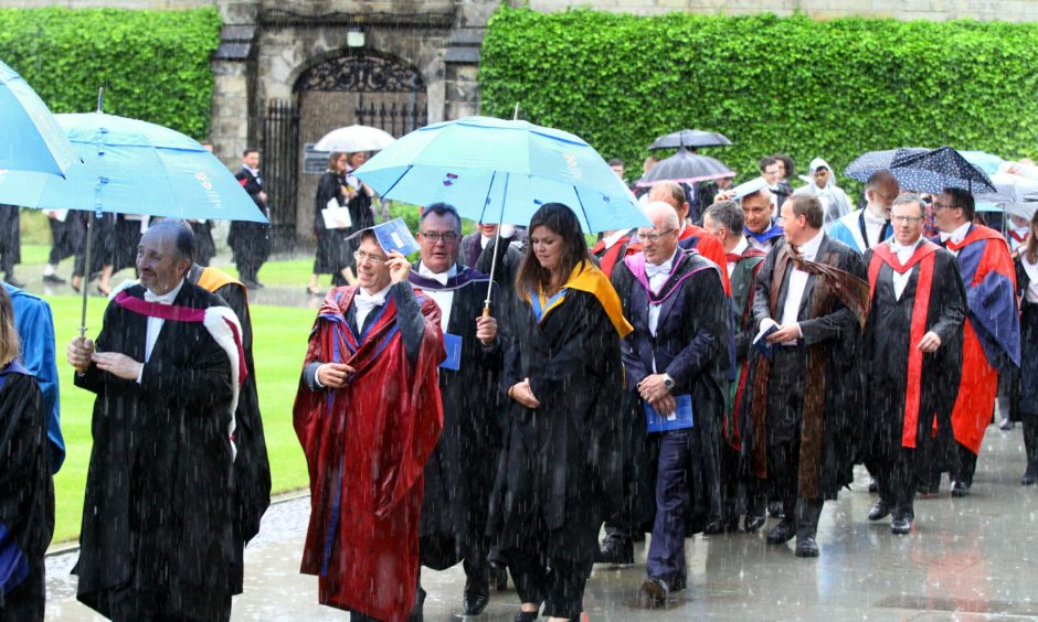 The rain poured for the first day of St Andrews University summer graduations.
All pictures by Gareth Jennings / DCT Media