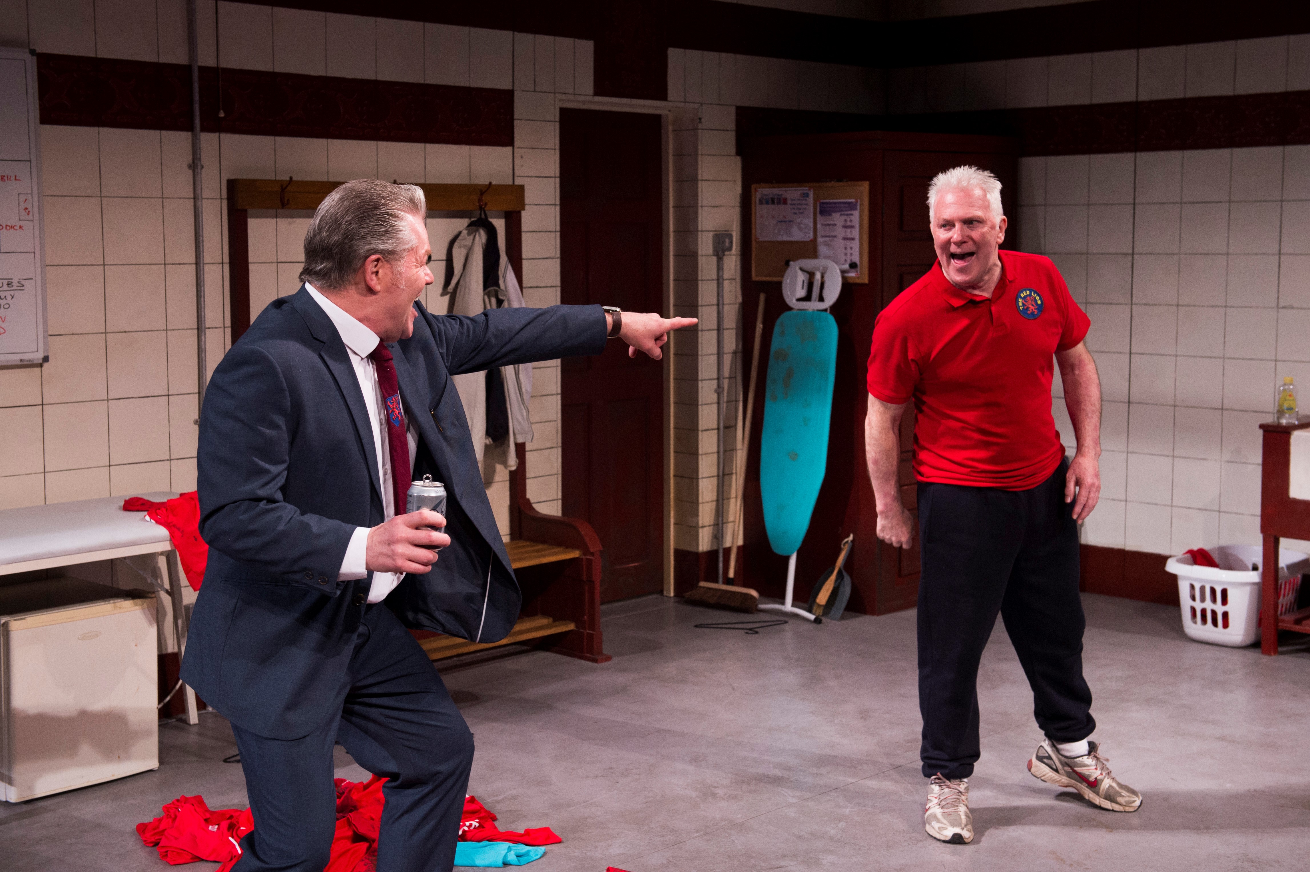 Kidd (Brendan Charleson) and Yates fight it out in the changing room.
