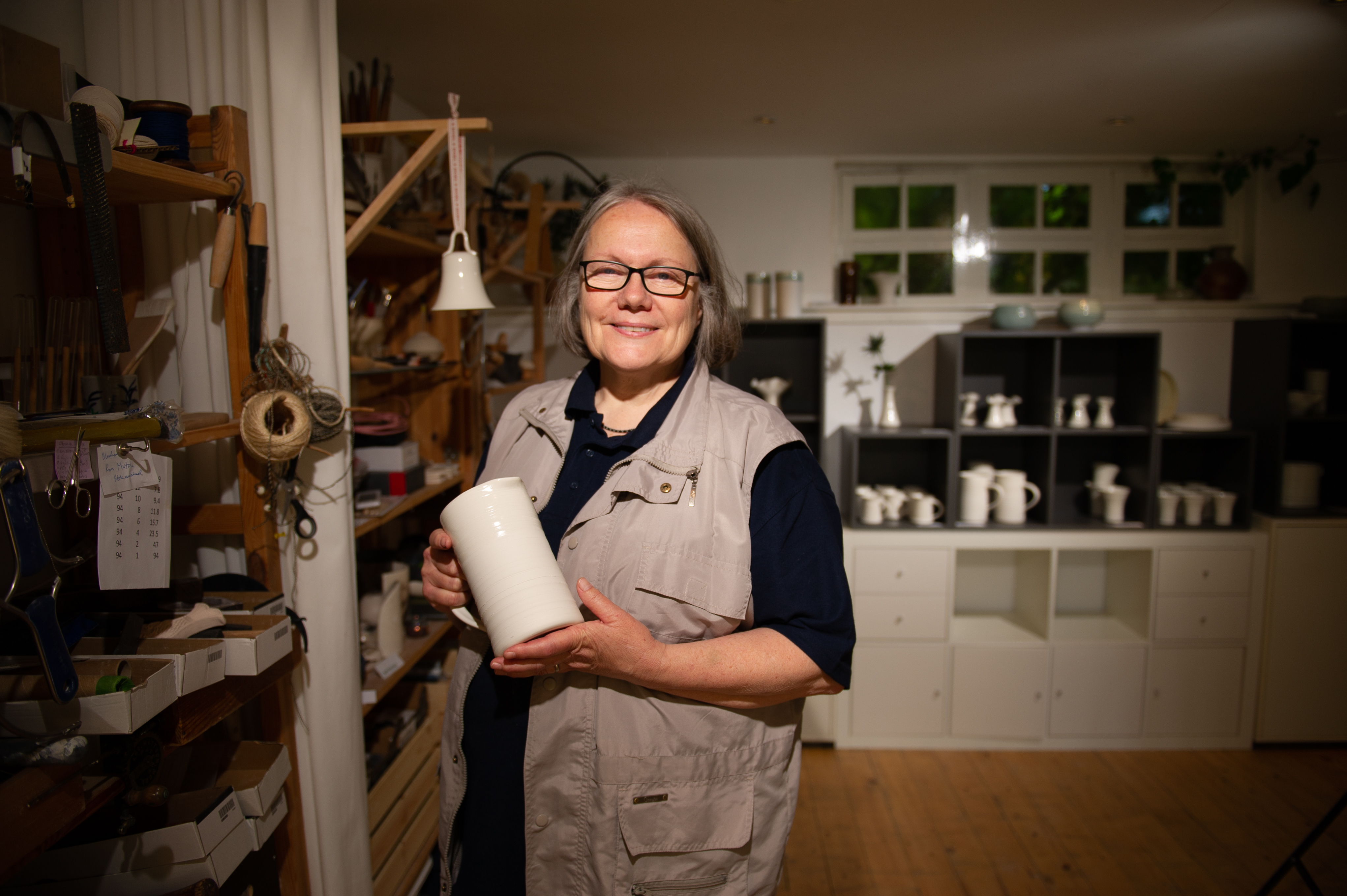 Maria Nordgren with some of her piece in Momentum Pottery, Alyth.