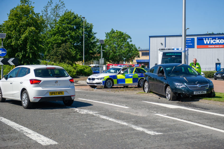 Car crashes into roundabout near Dundee Asda store