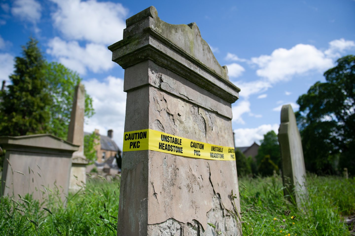 Some of the unstable headstones which are marked with safety tape at Greyfriars Burial Ground, Canal Street, Perth.
