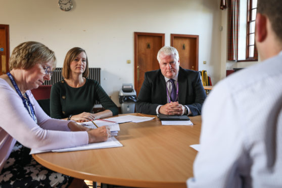 St John's High School headteacher Fiona McLagan, Julie Grace and Paul Clancy.