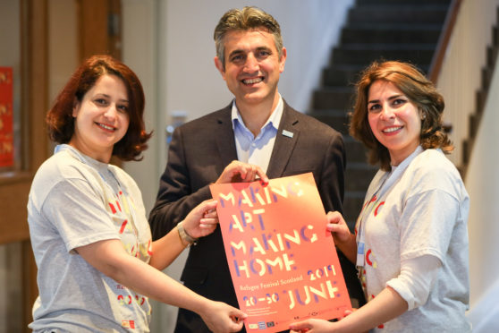 Sair Zazai, chief executive of Scottish Refugee Council, with Marwa Bushnaq and Samar Madalawi