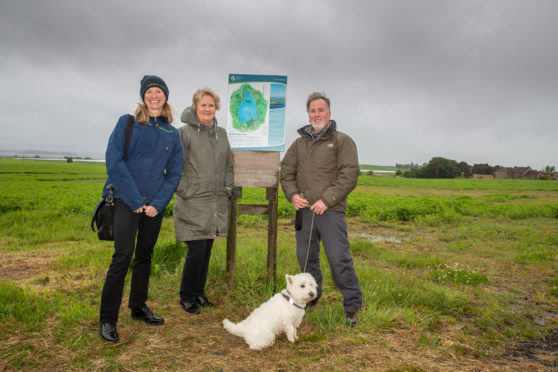 Roseanna Cunningham MSP, volunteer Dave Alston and his dog Murray and SNH Chief Executive Francesca Osowska were at Loch Leven, to mark the creation of more than 100 miles of new and improved paths across Scotland.