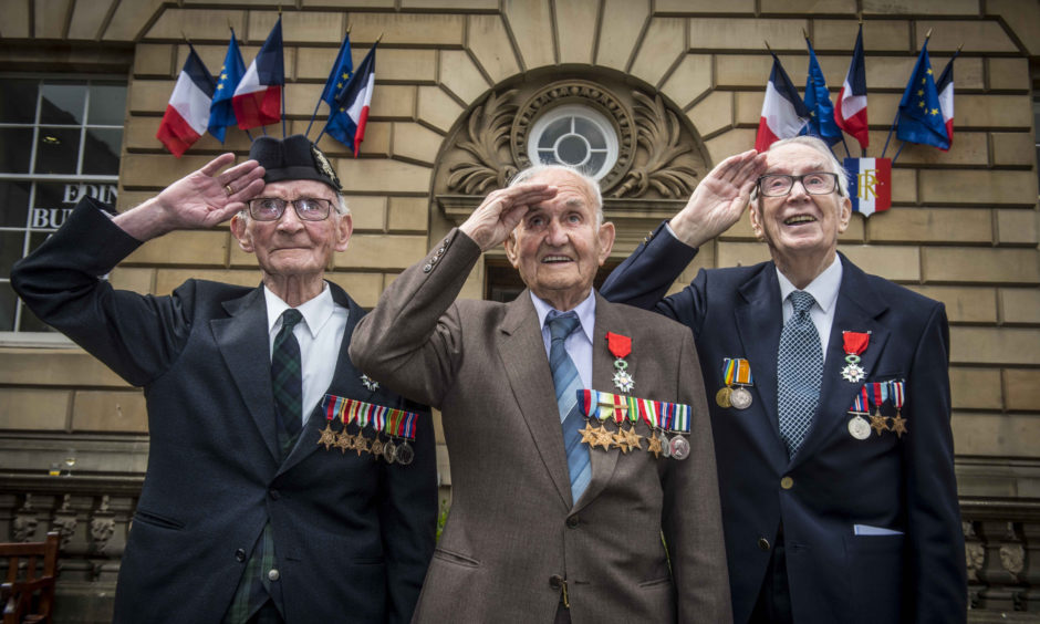 Veterans Jack Adamson David Livingston and Robert Jobson Paton.  A service at the French Consulate of Edinburgh, Scotland was held during commemorations for the 75th anniversary of the D-Day landings.
