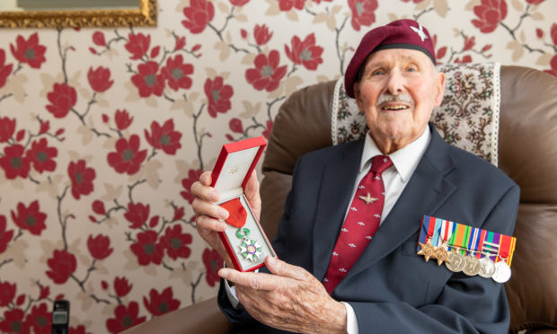 Pegasus Bridge liberator Eric Tandy with his Legion d'Honneur at home in Glenrothes in 2019