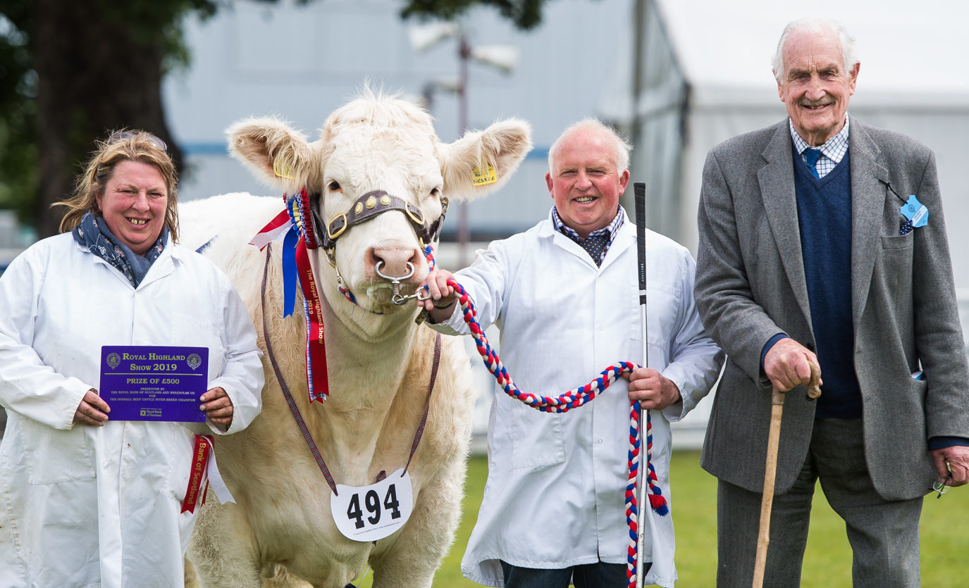 Tracey Nicoll, Davie Nicoll and Major David Walter with the Royal Highland Show beef interbreed champion.