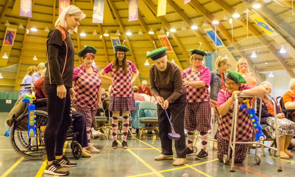 Some action from the event. Betty Cowie putting alongside staff from RDM Care Home, Scone. 
All pictures by Steve MacDougall / DCT Media