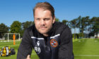 A relaxed Robbie Neilson at United's St Andrews training camp.