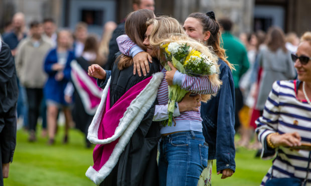 Hugs and happiness all around for these new graduates.