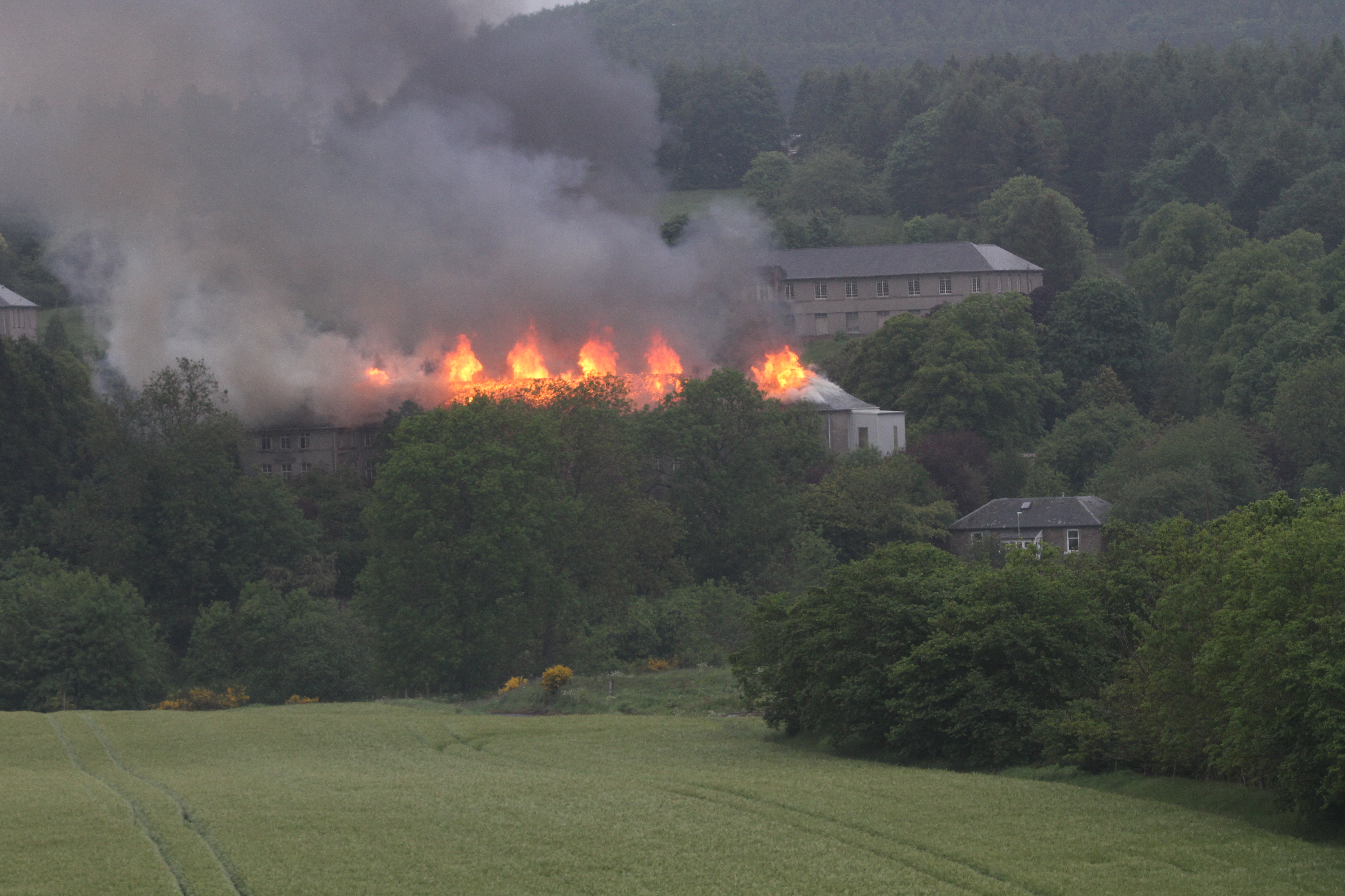 The roof of Strathmartine Hospital was on fire.