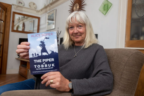 Alice Soper has written The Piper of Tobruk, an account of the distinguished military career of her father Pipe Major Robert Roy.