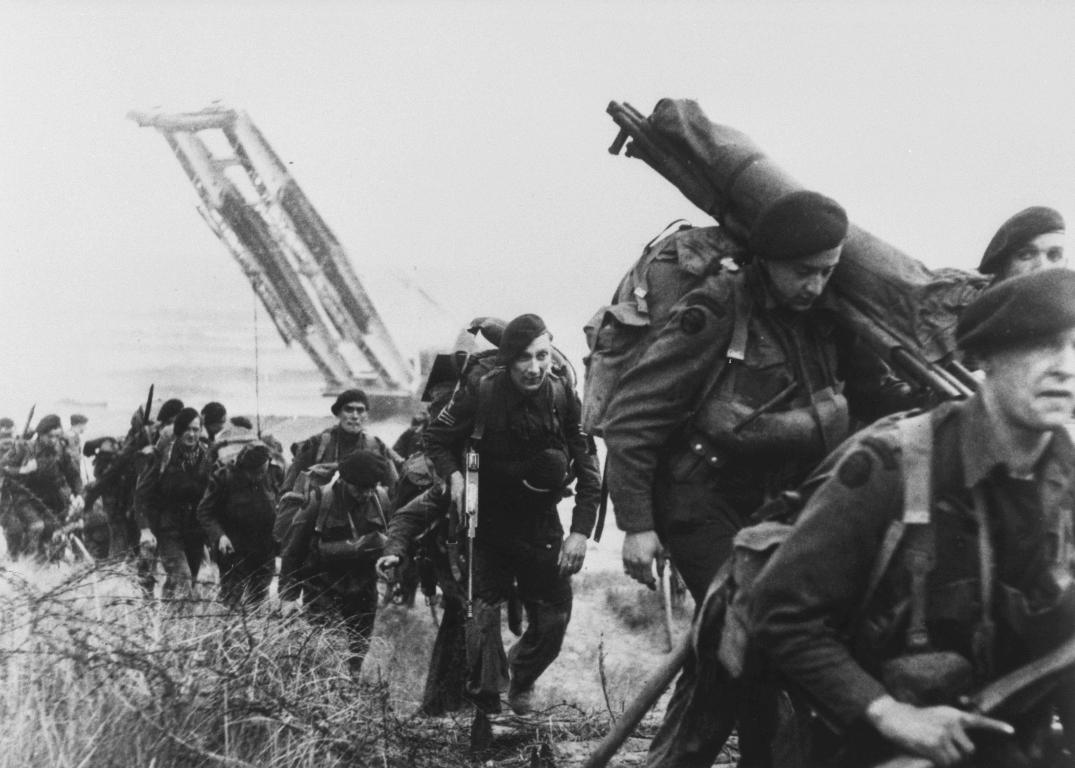 Royal Marine commandos moving off the Normandy Beaches during the advance inland from "Sword" beach.