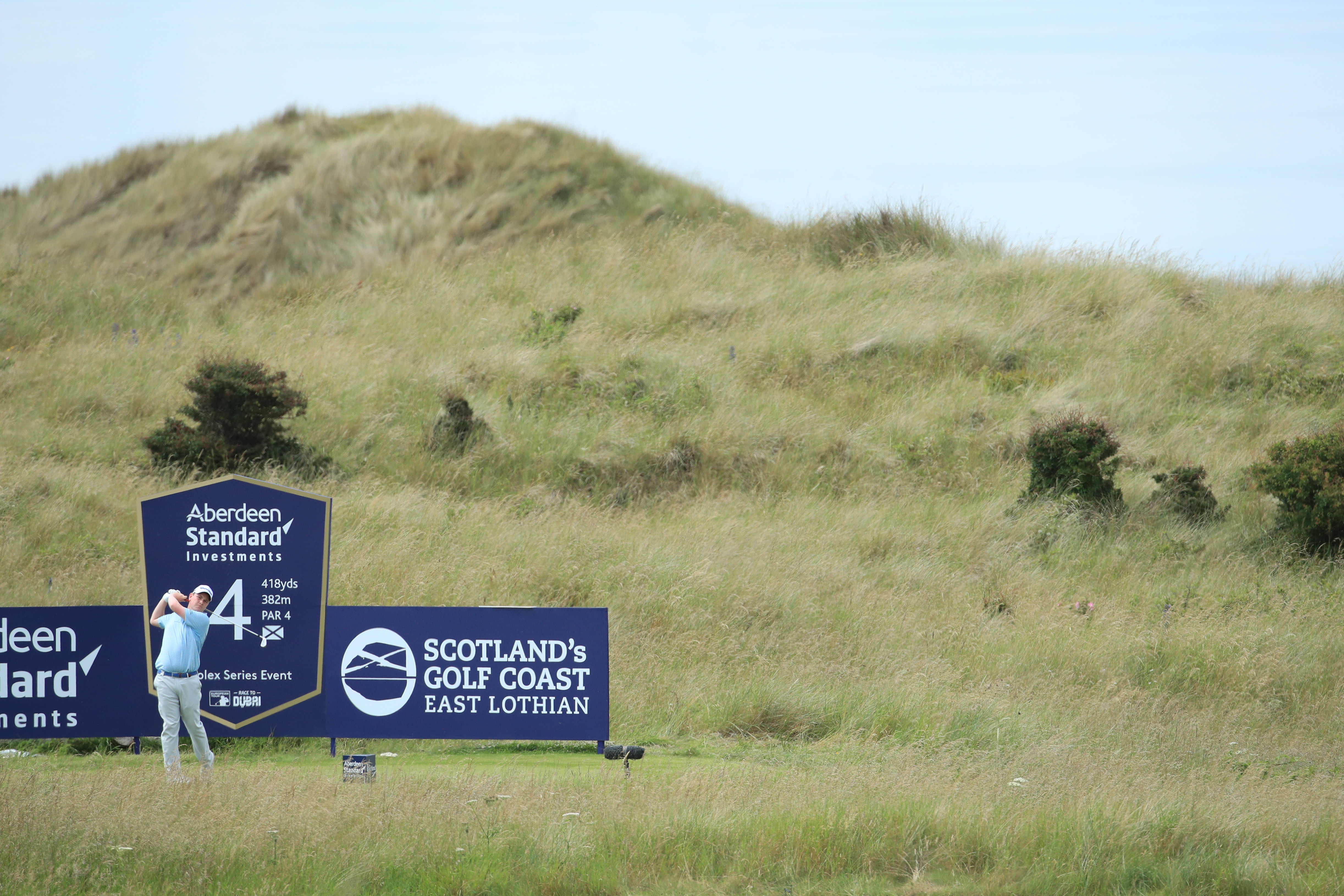 Robert MacIntyre tees off at the 4th during Day 1 of the Aberdeen Standard Investments Scottish Open at The Renaissance Club.
