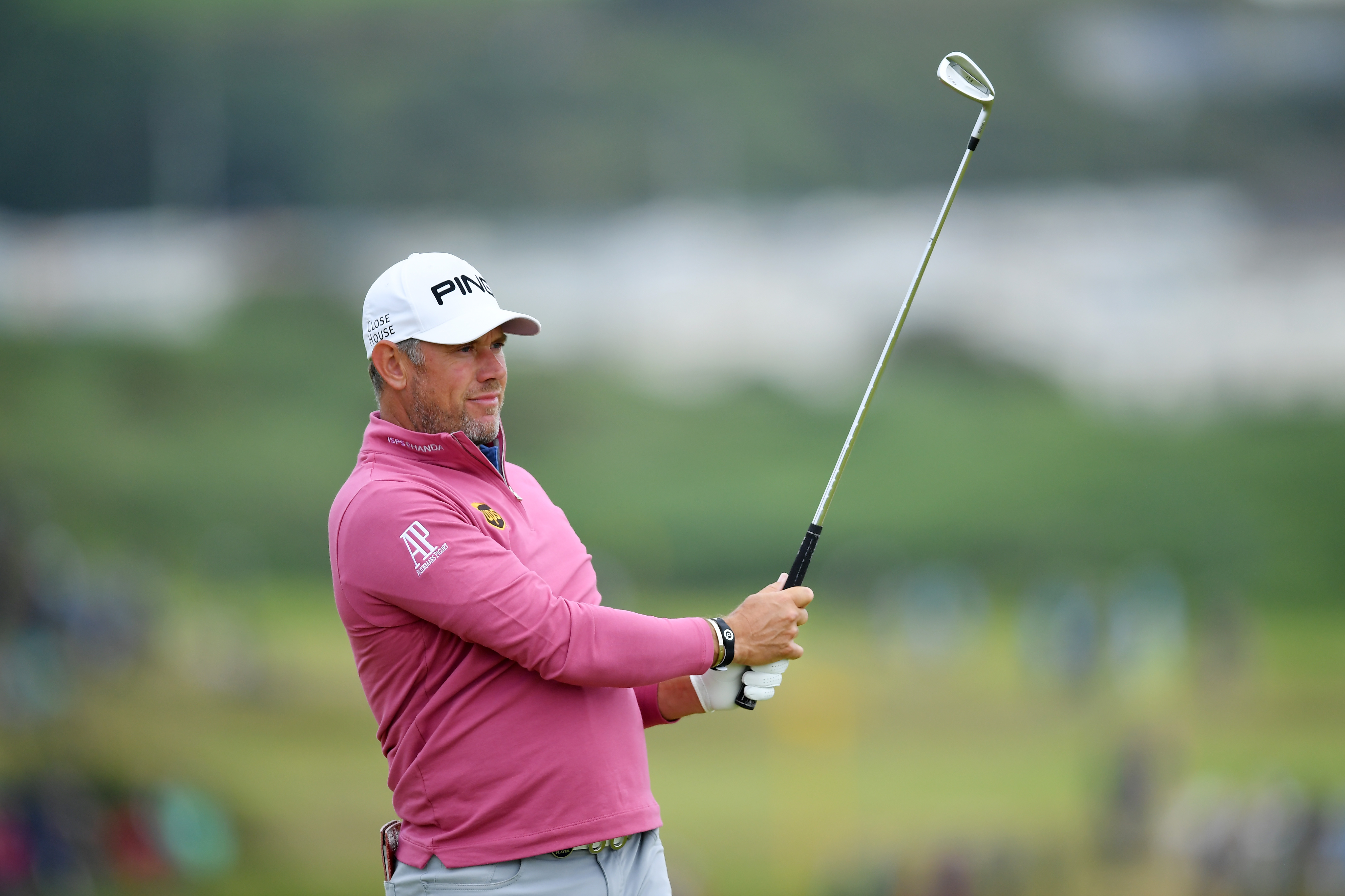 Lee Westwood tees off the 15th at Portrush yesterday.