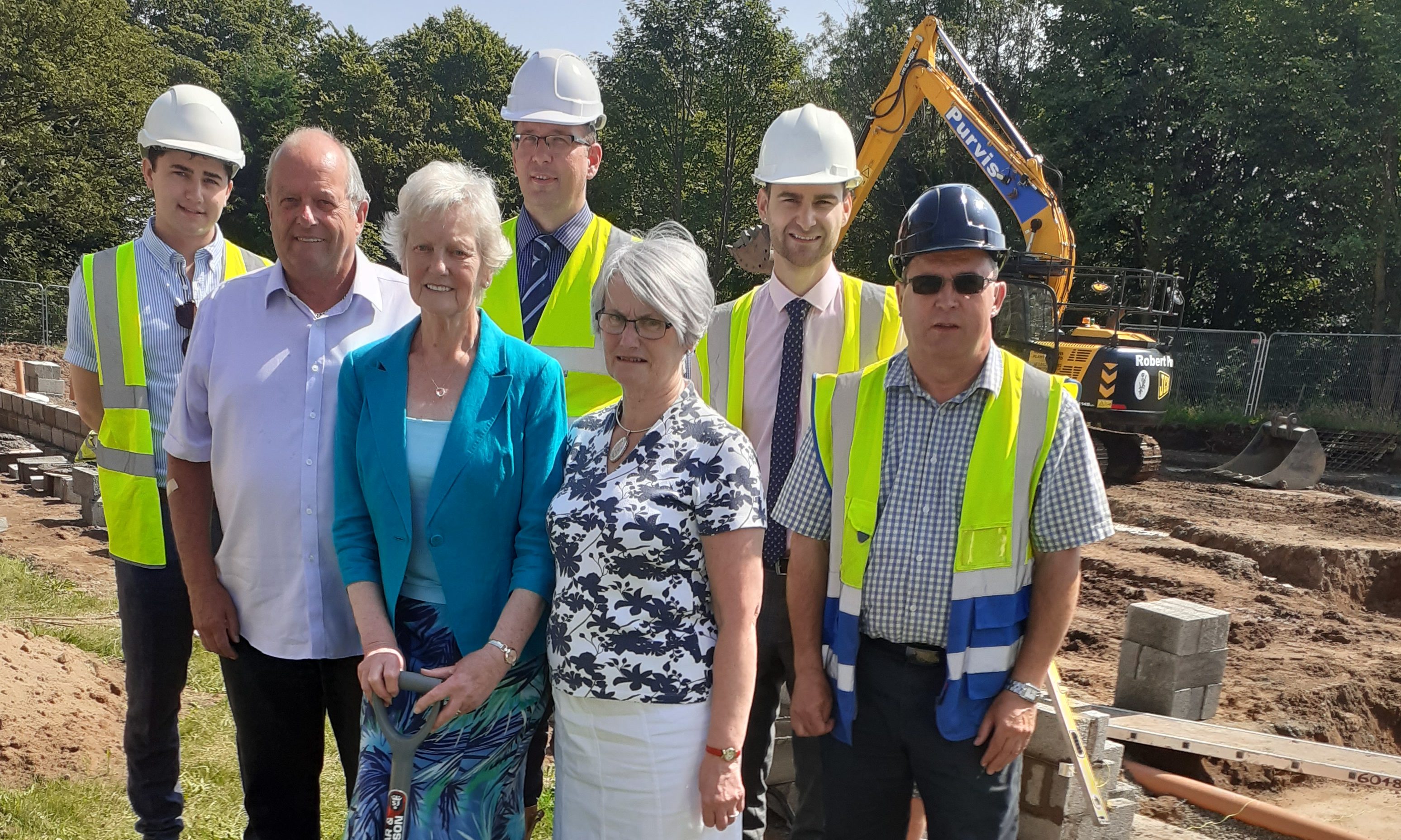 Representatives from Sinclair Watt Architects, Dryburgh Associates and David Adamson Quantity Surveyors along with Brian Cessford, site manager from DBM Building Contractors In the front are Gary Nurse, Christine Whitelaw and Margaret Rae from Wellesley Parish Church. Christine performed the  ground cutting