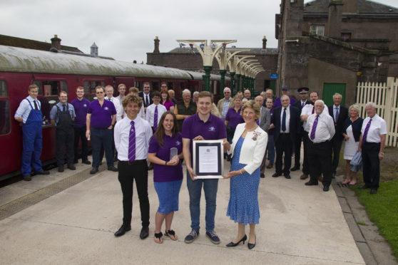 Socity volunteers (l-r) Ragnall Simmons, Kirsty Soutar and Andrew Pegg with Angus Lord Lieutenant Mrs Georgiana Osborne.