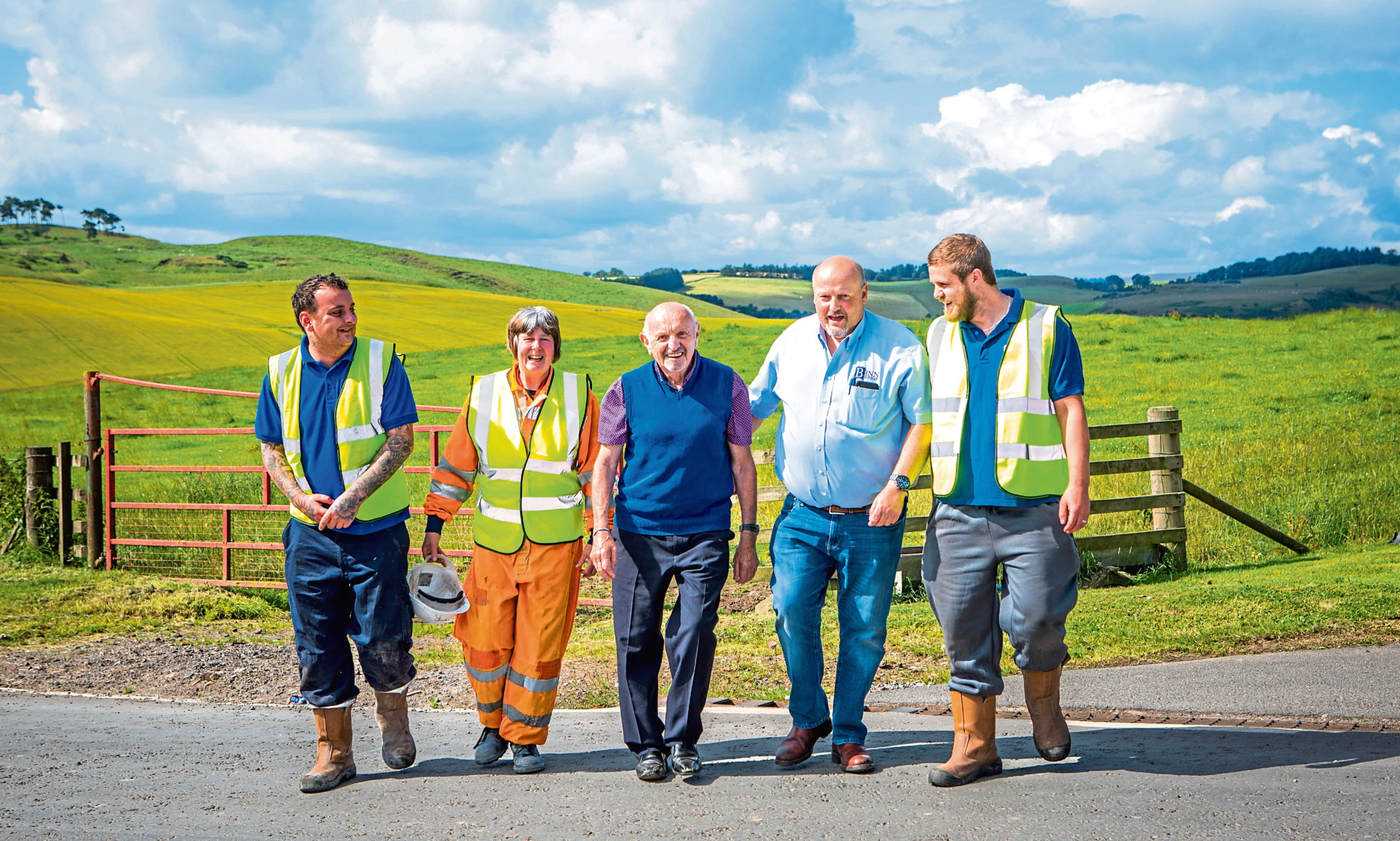 Binn Group staff Michael Kemp and Janet Ritchie with chairman John MacGregor, chief executive  Allan MacGregor and employee David Russell.