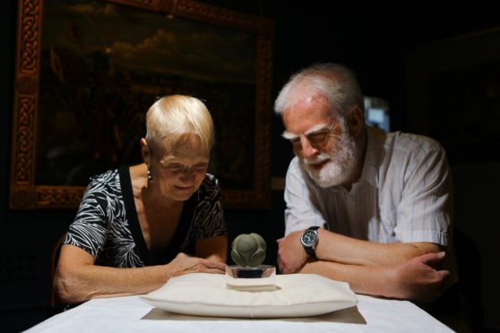 Margaret Borland-Stroyan and David Bowler with the stone