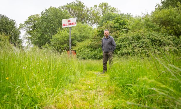 Councillor Forbes says unkempt greenspaces are making residents' lives " a misery".