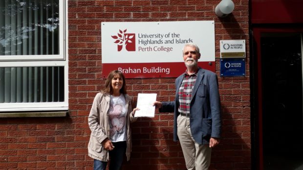 Elspeth McCole and Pete McCara hand over petition to save Crieff learning centre