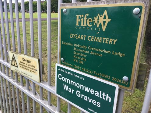 Police are investigating 
 thefts from a Fife graveside.